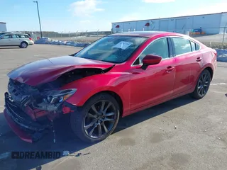 2016 Mazda 6 i Grand Touring with VIN JM1GJ1W51G1443203, listed as a IAAI auction lot 41247354 with 144,840 mi miles. Bid and sale history available at carsss.com. Image 2.