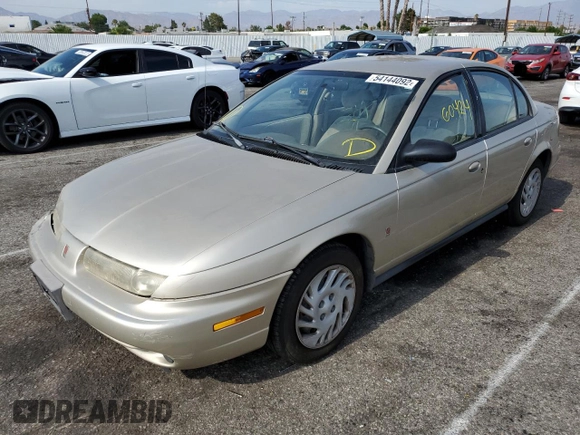 1999 Saturn SL with VIN 1G8ZK5275XZ262816, listed as a Copart auction lot 54144092 with 60,424 mi miles and Salvage title. Bid and sale history available at DreamBid. Image 2.