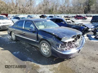2002 Lincoln Continental with VIN 1LNHM97V82Y612492, listed as a Copart auction lot 38197414 with 198,537 mi miles and Salvage Title. Bid and sale history available at carsss.com. Image 4.