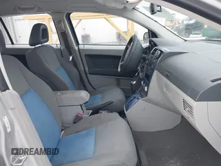 2007 Dodge Caliber SXT with VIN 1B3HB48B07D159549, listed as a IAAI auction lot 41330969 with 124,911 mi miles and . Bid and sale history available at DreamBid. Image 5.