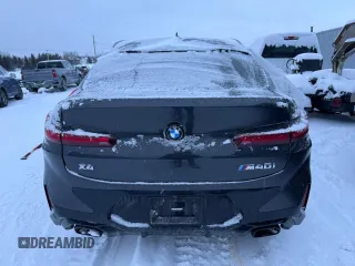 2023 BMW X4 M40i z VIN 5UX43DT03P9S61199, wystawiony jako Copart lot #86424734 z przebiegiem Nie podano mil oraz Szkody całkowita. Historia ofert i sprzedaży dostępna na DreamBid. Obrazek 6.