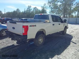 2017 Ford Super Duty F-250 SRW Lariat with VIN 1FT7W2B62HEE48815, listed as a IAAI auction lot 41736818 with 214,379 mi miles. Bid and sale history available at carsss.com. Image 4.