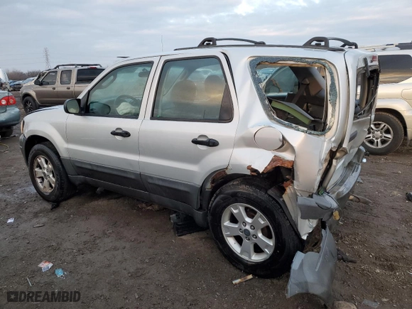 2003 Ford Escape XLS Popular with VIN 1FMYU92133KC98260, listed as a Copart auction lot 85364804 with 246,664 mi miles and Salvage Title. Bid and sale history available at carsss.com. Image 2.