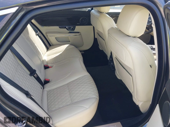 2016 Jaguar XJ Portfolio with VIN SAJWJ2GD3G8V93278, listed as a IAAI auction lot 42304155 with 52,462 mi miles and . Bid and sale history available at DreamBid. Image 8.
