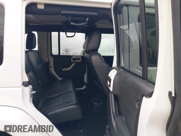 2017 Jeep Wrangler Unlimited Sahara with VIN 1C4BJWEG4HL752776, listed as a IAAI auction lot 41834737 with 110,791 mi miles. Bid and sale history available at carsss.com. Image 8.