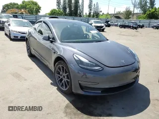 2023 Tesla Model 3 with VIN 5YJ3E1EA8PF704349, listed as a Copart auction lot 60220665 with 18,873 mi miles and Non repairable. Bid and sale history available at DreamBid. Image 13.
