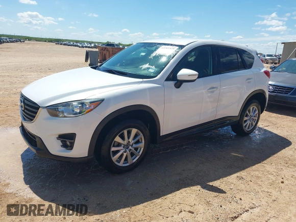 2016 Mazda CX-5 Touring z VIN JM3KE2CY0G0840918, wystawiony jako IAAI lot #42205529 z przebiegiem 74 515 mil mil oraz . Historia ofert i sprzedaży dostępna na DreamBid. Obrazek 18.