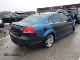 2009 Pontiac G8 with VIN 6G2ER57779L164764, listed as a IAAI auction lot 41178467 with 205,282 mi miles. Bid and sale history available at carsss.com. Image 4.