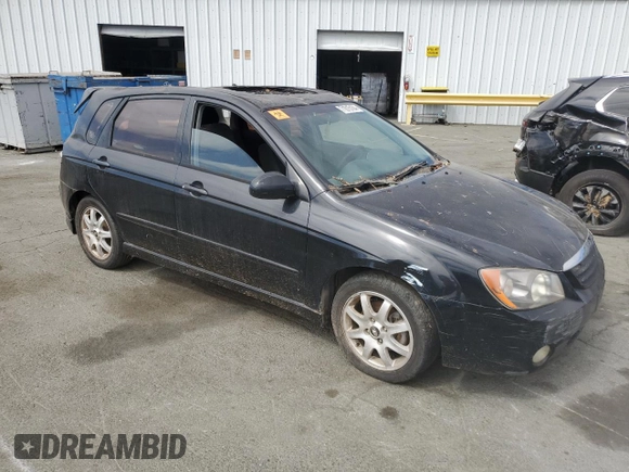 2005 Kia Spectra with VIN KNAFE162655074198, listed as a Copart auction lot 71015104 with 200,819 mi miles and Salvage Title. Bid and sale history available at DreamBid. Image 4.