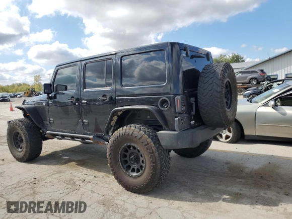 2014 Jeep Wrangler Unlimited Rubicon X с VIN 1C4HJWFG0EL142071, выставлен на аукционе Copart как лот 72898994 с пробегом 110 597 миль миль и Списание • Salvage title. История ставок и продаж доступна на DreamBid. Изображение 2.