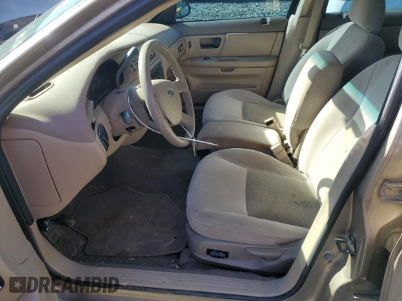 2004 Ford Taurus SE with VIN 1FAFP53U34A104053, listed as a Copart auction lot 47086045 with Not Provided miles and Salvage Title. Bid and sale history available at DreamBid. Image 7.