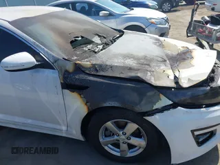 2015 Kia Optima LX with VIN 5XXGM4A78FG464232, listed as a IAAI auction lot 42097937 with Not Provided miles and . Bid and sale history available at DreamBid. Image 12.