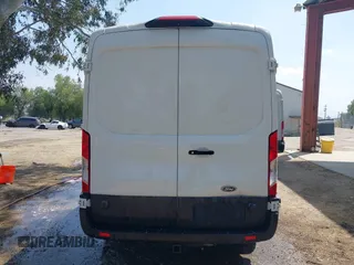 2019 Ford Transit with VIN 1FTYR2CM5KKB19415, listed as a IAAI auction lot 42129144 with 198,457 mi miles and . Bid and sale history available at DreamBid. Image 15.