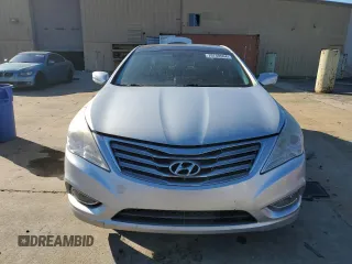 2014 Hyundai Azera Limited z VIN KMHFH4JG3EA360317, wystawiony jako Copart lot #79748564 z przebiegiem Nie podano mil oraz Szkoda całkowita • Salvage title. Historia ofert i sprzedaży dostępna na DreamBid. Obrazek 5.