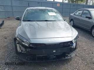 2022 Kia Forte GT-Line z VIN 3KPF54AD0NE490720, wystawiony jako IAAI lot #42168294 z przebiegiem 25 875 mil mil oraz . Historia ofert i sprzedaży dostępna na DreamBid. Obrazek 12.