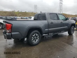 2017 Toyota Tacoma SR5 z VIN 3TMDZ5BN1HM030372, wystawiony jako Copart lot #54547985 z przebiegiem 67 663 mil mil oraz Szkoda całkowita • Salvage title. Historia ofert i sprzedaży dostępna na DreamBid. Obrazek 3.