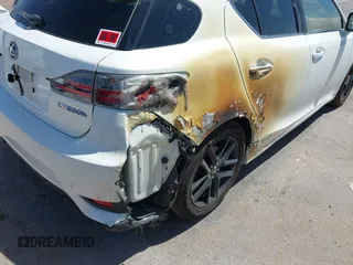 2015 Lexus CT 200h with VIN JTHKD5BH2F2232110, listed as a IAAI auction lot 42168907 with 89,056 mi miles and . Bid and sale history available at DreamBid. Image 6.