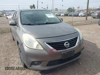 2014 Nissan Versa SV with VIN 3N1CN7AP6EL854426, listed as a IAAI auction lot 41700018 with 128,163 mi miles. Bid and sale history available at carsss.com. Image 1.