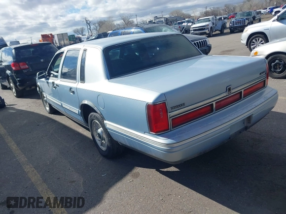 1997 Lincoln Town Car Executive z VIN 1LNLM81W4VY750458, wystawiony jako IAAI lot #41656839 z przebiegiem 150 569 mil mil oraz . Historia ofert i sprzedaży dostępna na DreamBid. Obrazek 3.