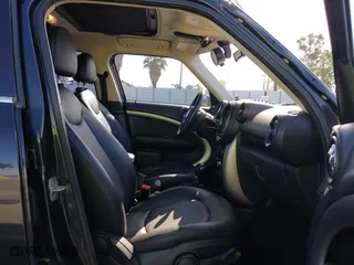 2013 MINI Cooper Countryman with VIN WMWZB3C52DWM07621, listed as a IAAI auction lot 42085389 with 153,714 mi miles. Bid and sale history available at carsss.com. Image 5.