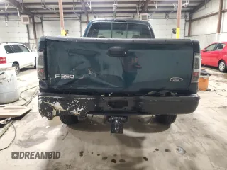1999 Ford F-350 XL with VIN 1FTSX31S9XEA95645, listed as a Copart auction lot 43423285 with 169,449 mi miles and Salvage Title. Bid and sale history available at DreamBid. Image 6.