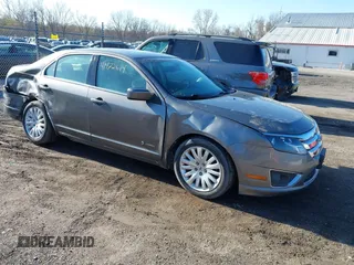 2010 Ford Fusion Hybrid z VIN 3FADP0L35AR423330, wystawiony jako IAAI lot #41972619 z przebiegiem 154 026 mil mil oraz . Historia ofert i sprzedaży dostępna na DreamBid. Obrazek 1.