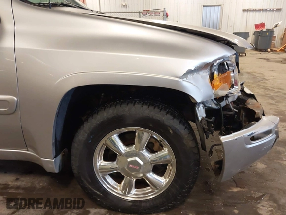 2005 GMC Envoy SLE with VIN 1GKET16S656102522, listed as a IAAI auction lot 41729310 with 233,049 mi miles. Bid and sale history available at carsss.com. Image 20.