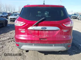 2015 Ford Escape Titanium z VIN 1FMCU9J9XFUC75357, wystawiony jako IAAI lot #41705474 z przebiegiem 198 381 mil mil oraz . Historia ofert i sprzedaży dostępna na DreamBid. Obrazek 16.