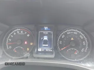 2022 Toyota Tacoma SR with VIN 3TYRX5GNXNT056019, listed as a IAAI auction lot 42026358 with 40,750 mi miles and . Bid and sale history available at DreamBid. Image 7.