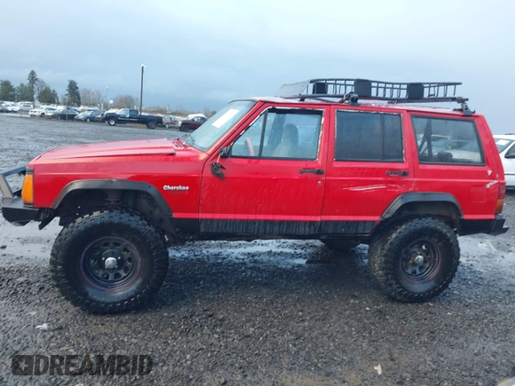1996 Jeep Cherokee Sport with VIN 1J4FJ68S4TL244893, listed as a IAAI auction lot 41190369 with 192,459 mi miles and . Bid and sale history available at DreamBid. Image 15.