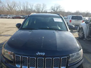2014 Jeep Compass Latitude with VIN 1C4NJDEBXED661930, listed as a IAAI auction lot 41501558 with 94,133 mi miles and . Bid and sale history available at DreamBid. Image 6.