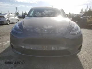 2022 Tesla Model Y Performance with VIN 7SAYGDEF3NF490643, listed as a Copart auction lot 46975825 with 50,792 mi miles and Salvage Title. Bid and sale history available at DreamBid. Image 5.