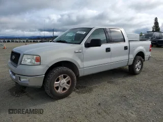 2004 Ford F-150 XLT with VIN 1FTPW12564KB97309, listed as a Copart auction lot 52025335 with 162,549 mi miles and Salvage Title. Bid and sale history available at carsss.com. Image 1.