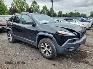 2014 Jeep Cherokee Trailhawk with VIN 1C4PJMBS3EW127928, listed as a Copart auction lot 63825865 with 172,712 mi miles and Salvage title. Bid and sale history available at DreamBid. Image 4.