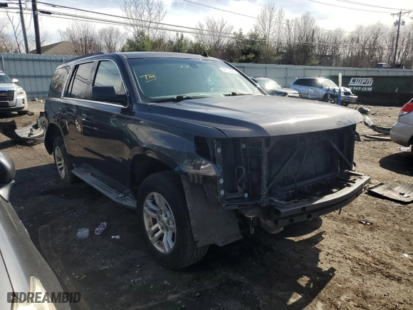 2015 Chevrolet Tahoe LS with VIN 1GNSKAKC2FR252599, listed as a Copart auction lot 48714885 with 140,946 mi miles and Salvage Title. Bid and sale history available at carsss.com. Image 4.