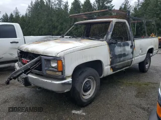 2000 GMC Sierra 1500 with VIN 1GTGC34R2YR191556, listed as a Copart auction lot 52346615 with Not Provided miles and Salvage Title. Bid and sale history available at DreamBid. Image 1.