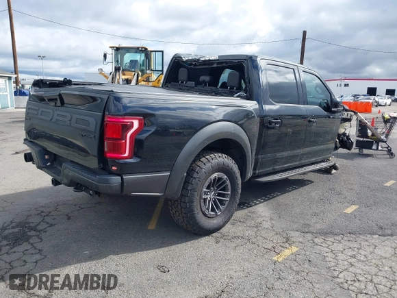2020 Ford F-150 Raptor with VIN 1FTFW1RG2LFA30858, listed as a IAAI auction lot 41793692 with 90,018 mi miles and . Bid and sale history available at carsss.com. Image 4.