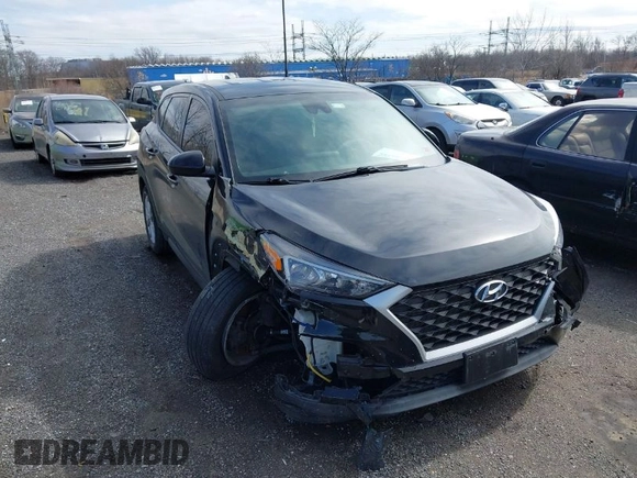 2019 Hyundai Tucson SE with VIN KM8J2CA46KU977863, listed as a IAAI auction lot 41704318 with 23,076 mi miles. Bid and sale history available at carsss.com. Image 1.