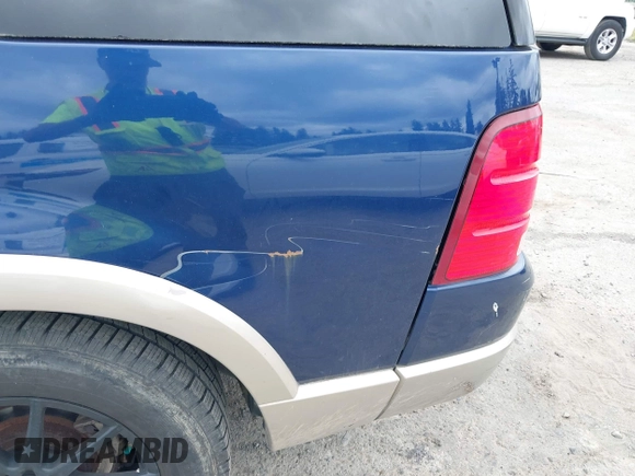 2005 Ford Explorer Eddie Bauer with VIN 1FMDU74K65UB36705, listed as a IAAI auction lot 42704357 with 207,245 mi miles and . Bid and sale history available at DreamBid. Image 14.