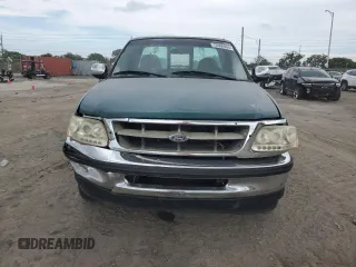 1998 Ford F-150 XL with VIN 1FTRF17L0WNA48153, listed as a Copart auction lot 72606904 with 213,592 mi miles and Non repairable. Bid and sale history available at DreamBid. Image 5.