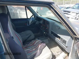 1996 Jeep Cherokee Country with VIN 1J4FT78S5TL148433, listed as a IAAI auction lot 41722054 with 276,612 mi miles and . Bid and sale history available at DreamBid. Image 5.