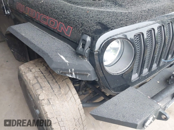 2021 Jeep Wrangler Unlimited Rubicon with VIN 1C4HJXFN2MW587168, listed as a IAAI auction lot 42472309 with 66,272 mi miles and . Bid and sale history available at DreamBid. Image 6.
