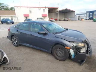 2019 Honda Civic Sedan LX with VIN 19XFC2F60KE018100, listed as a IAAI auction lot 41908486 with 124,357 mi miles. Bid and sale history available at carsss.com. Image 13.