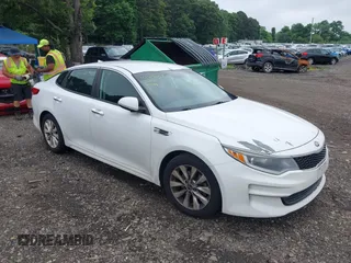 2016 Kia Optima LX with VIN 5XXGT4L34GG012129, listed as a IAAI auction lot 42728058 with 220,494 mi miles and . Bid and sale history available at DreamBid. Image 1.