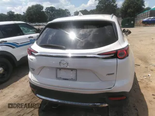 2017 Mazda CX-9 Signature with VIN JM3TCBEY2H0140598, listed as a IAAI auction lot 42561999 with 61,574 mi miles and . Bid and sale history available at DreamBid. Image 16.