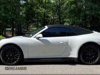 2014 Porsche 911 Carrera z VIN WP0CA2A92ES140453, wystawiony jako IAAI lot #42302853 z przebiegiem 47 879 mil mil oraz . Historia ofert i sprzedaży dostępna na DreamBid. Obrazek 13.