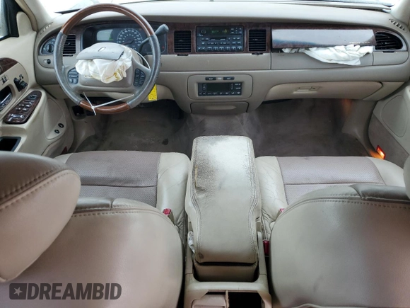 2000 Lincoln Town Car Signature с VIN 1LNHM82W1YY903645, выставлен на аукционе Copart как лот 55663175 с пробегом Не указан миль и Списание • Salvage title. История ставок и продаж доступна на DreamBid. Изображение 8.