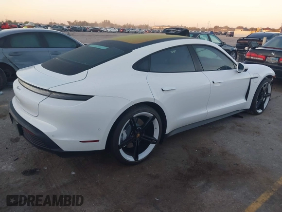 2022 Porsche Taycan with VIN WP0AA2Y10NSA13775, listed as a IAAI auction lot 40645854 with 19,149 mi miles and . Bid and sale history available at DreamBid. Image 4.
