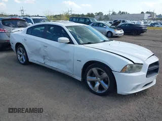 2011 Dodge Charger RT Plus with VIN 2B3CL5CT0BH609483, listed as a IAAI auction lot 40474315 with 202,644 mi miles. Bid and sale history available at carsss.com. Image 1.