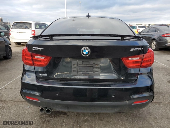 2014 BMW 3 Series Gran Turismo 328i xDrive with VIN WBA3X5C55ED557030, listed as a Copart auction lot 79119084 with 105,231 mi miles and Salvage Title. Bid and sale history available at carsss.com. Image 6.
